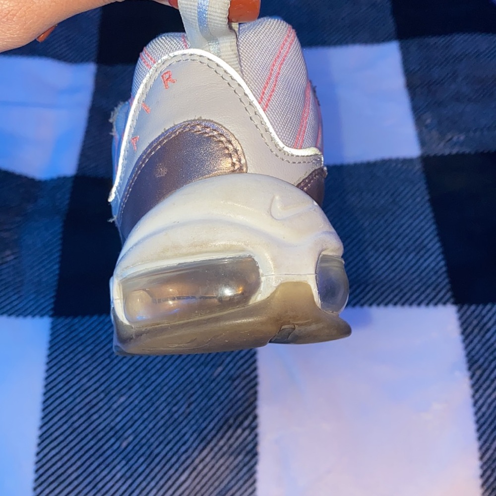 Pink and white Nikes